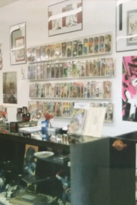 The display cases at Rocket Comics, filled with collectibles and back issues