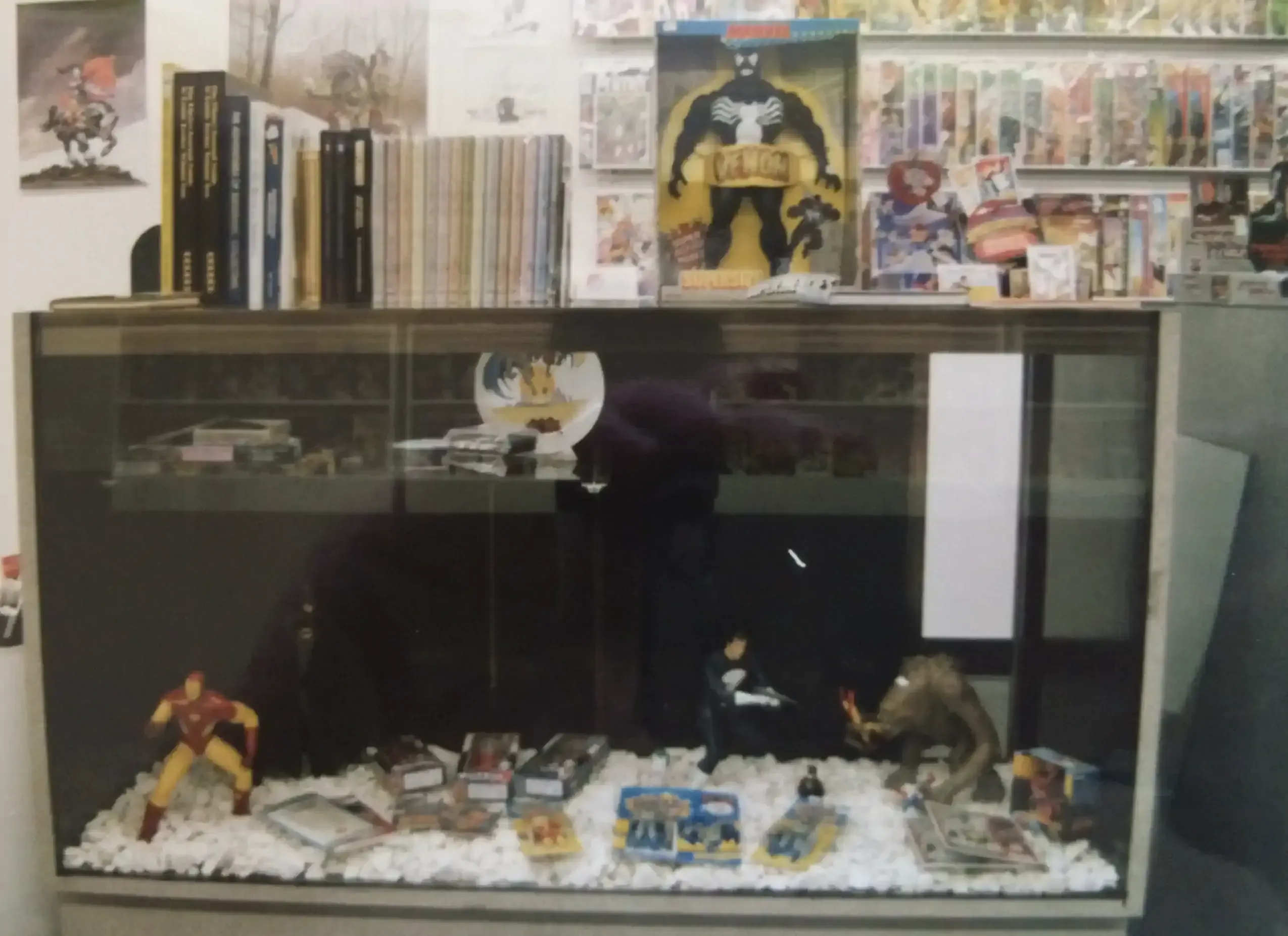 A close-up of another display case at Rocket Comics. Look at that cool Rancor figure from Kenner!