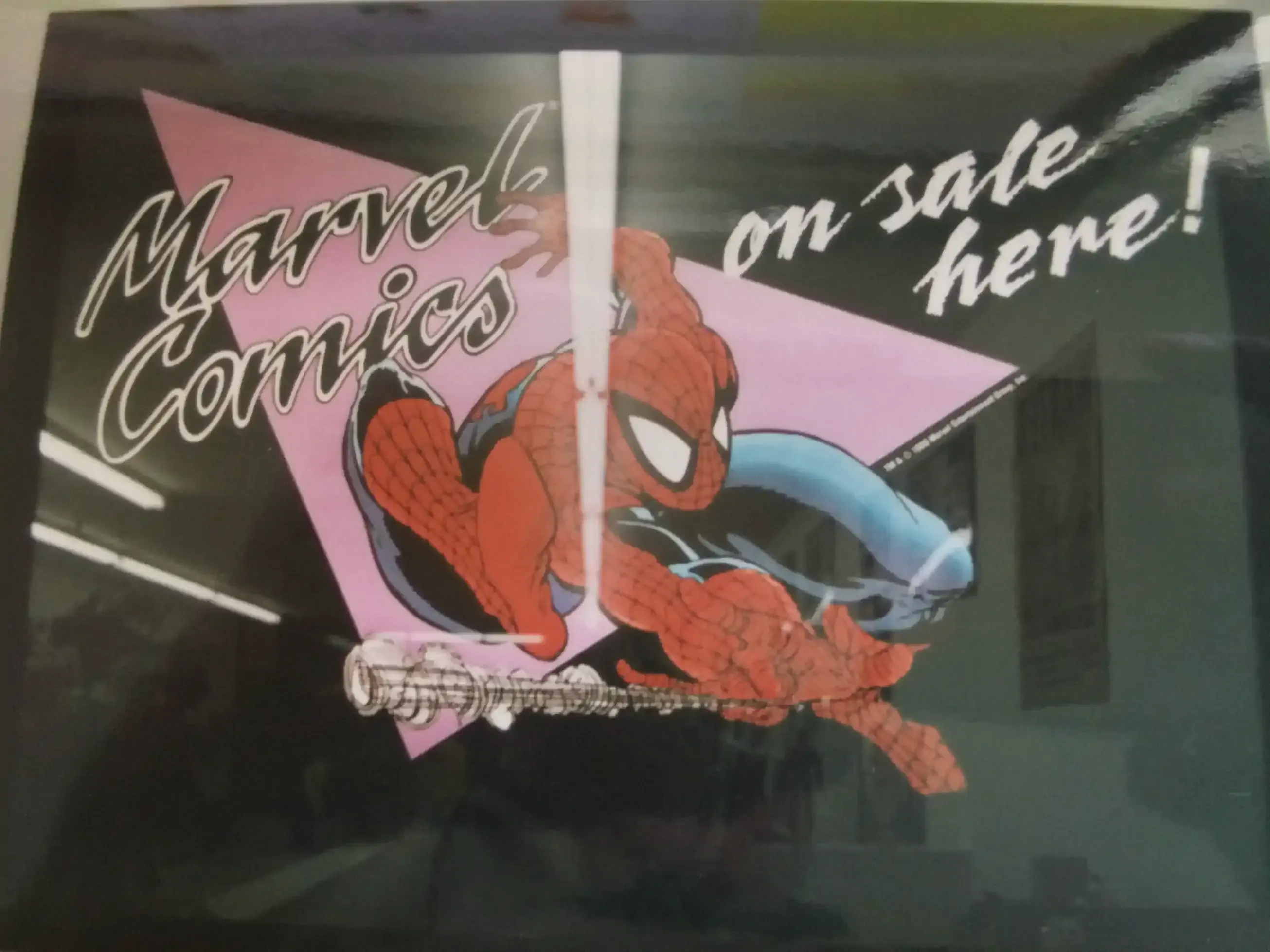 A lighted display sign promoting Marvel Comics. Love the McFarlane Spider-Man