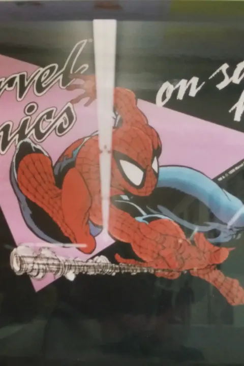 A lighted display sign promoting Marvel Comics. Love the McFarlane Spider-Man