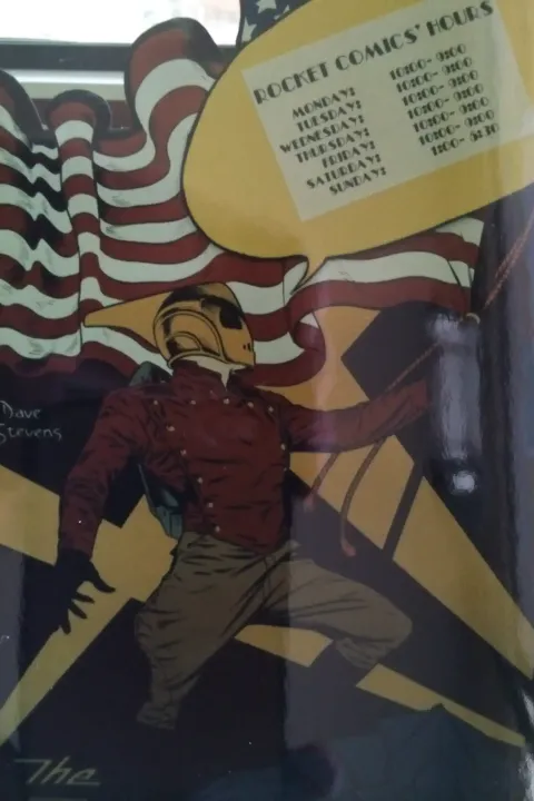 The Rocketeer greets customers at the grand opening of Rocket Comics